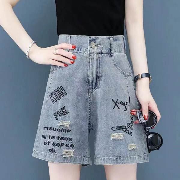Quần short denim khoét lỗ