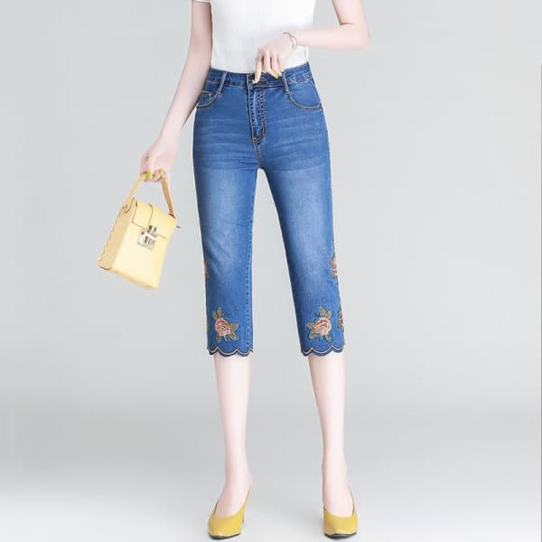 Quần jeans cạp cao thêu hoa